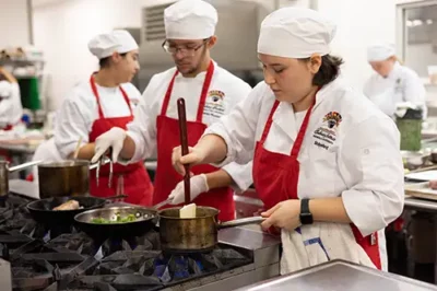 nicholls culinary students cooking in the kitchen