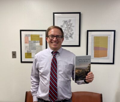 Dr. Martin with hard copy of Appalachian Pastoral