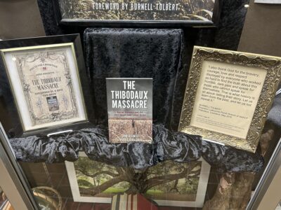 A portion of a display on the second floor of the Ellender Memorial Library. The display contains materials on The Thibodaux Massacre.