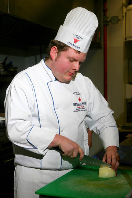 Jason Flato, a junior in the John Folse Culinary Institute at Nicholls State University and winner of South Central Region San Pellegrino “Almost Famous Chef Competition,” works in the institute’s kitchen.