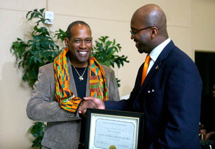 Tommy Ponson (left), director of parking services and judicial affairs at Nicholls State University, receives the 2009 Staff Unity Achievement Award from Dr. Rushton Johnson, dean of student life, at the 3rd Annual Unity Gala. The ceremony was conducted Thursday, Feb. 26, in the Cotillion Ballroom of the Bollinger Memorial Student Union.
