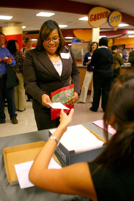 Jazlyn Oliver of Minden, La., receives her scholarship offer on Tuesday, Jan. 27, at the first of three Scholars’ Day banquets in Galliano Dining Hall at Nicholls State University.