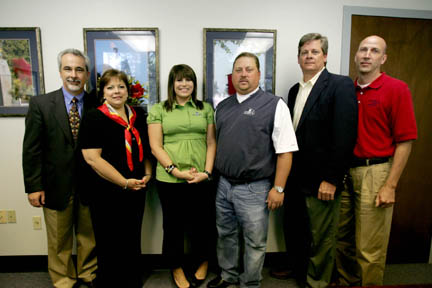 ES&H Signing- College of BusinessHall of Fame 2009 Pictured from left are Dr. Shawn Mauldin, dean of the College of Business Administration; Dr. Sonya Premeaux, associate dean; Keli Bonvillain, ES&H marketing director; Trey Boucvalt, ES&H president; Dr. Ken Chadwick, head of the Nicholls Department of Management and Marketing; and Dr. Michael Chiasson, head of the Department of Accounting and Information Systems.