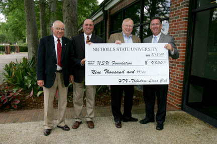 nicholls lions club htv foundation donate thibodaux game football university john conducted showdown bayou guidry charity stadium dec saturday river