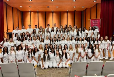 Photograph of the BSN graduating class of Spring 2026 at the BSN Pinning Ceremony, held on May 14, 2026.